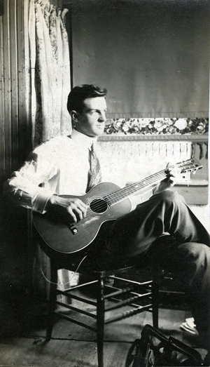 While visiting a family in Santa Rosa, California, Ray picked up a guitar and tried to play some chords.  The family presented the guitar to him.
